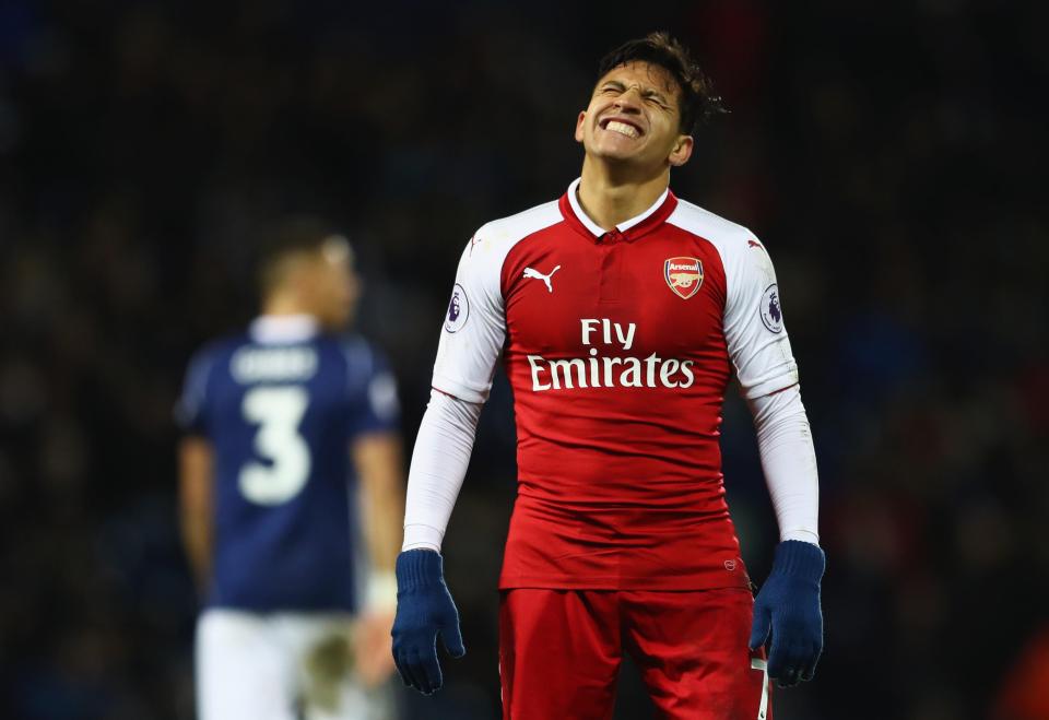  Alexis Sanchez was left out of Arsenal's squad at Bournemouth with Wenger saying he expected the Chilean's future to be 'decided within 48 hours'