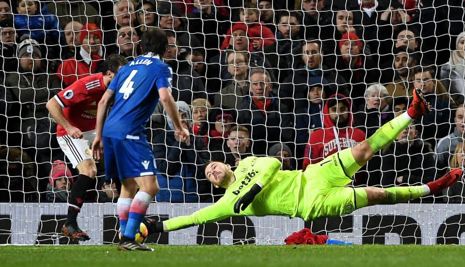  Butland makes a save in Stokes defeat at Man Utd on Monday