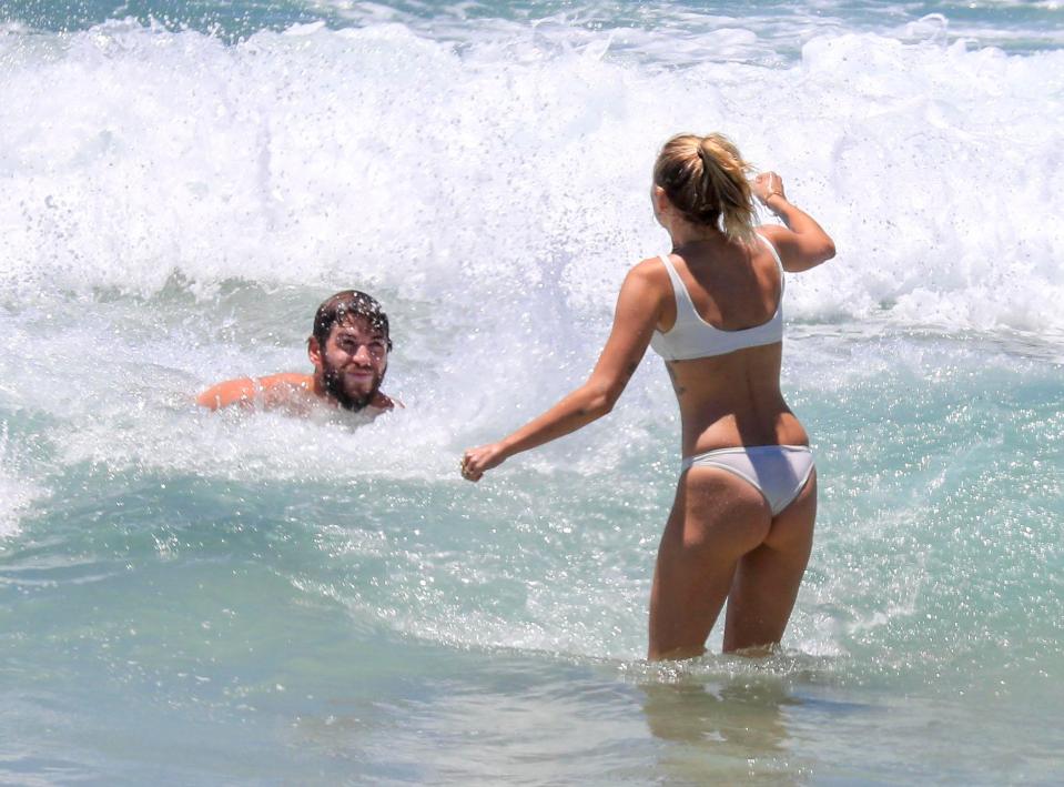  Miley splashed around with fiance Liam Hemsworth