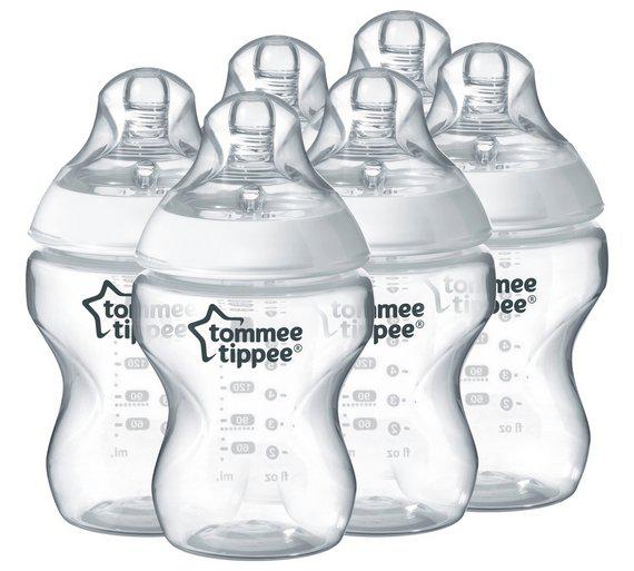 Anti-colic bottles may help.  Tommee Tippee Closer to Nature bottles, pictured.