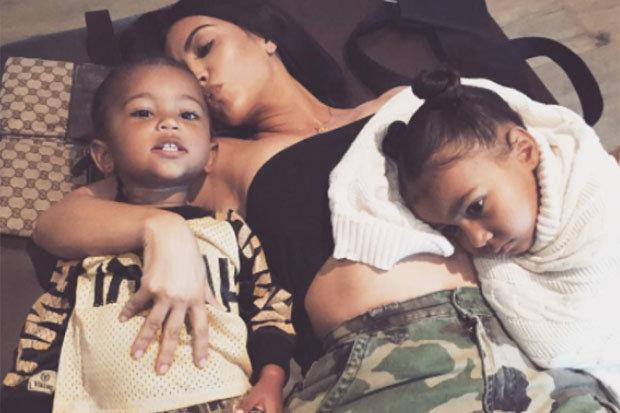  Kim with her children Saint and North West