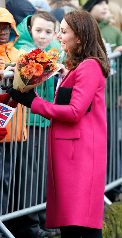  Kate growing bump was barely visible under the £1,500 coat