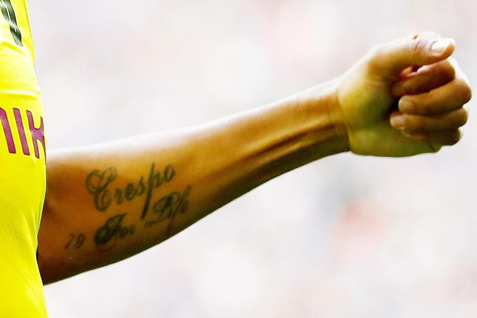  Pierre-Emerick Aubameyang has a tattoo on his arm that reads 'Crespo for Life'