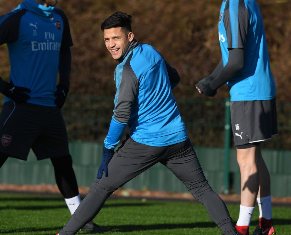  The Chilean has a laugh as he stretches out during his training session