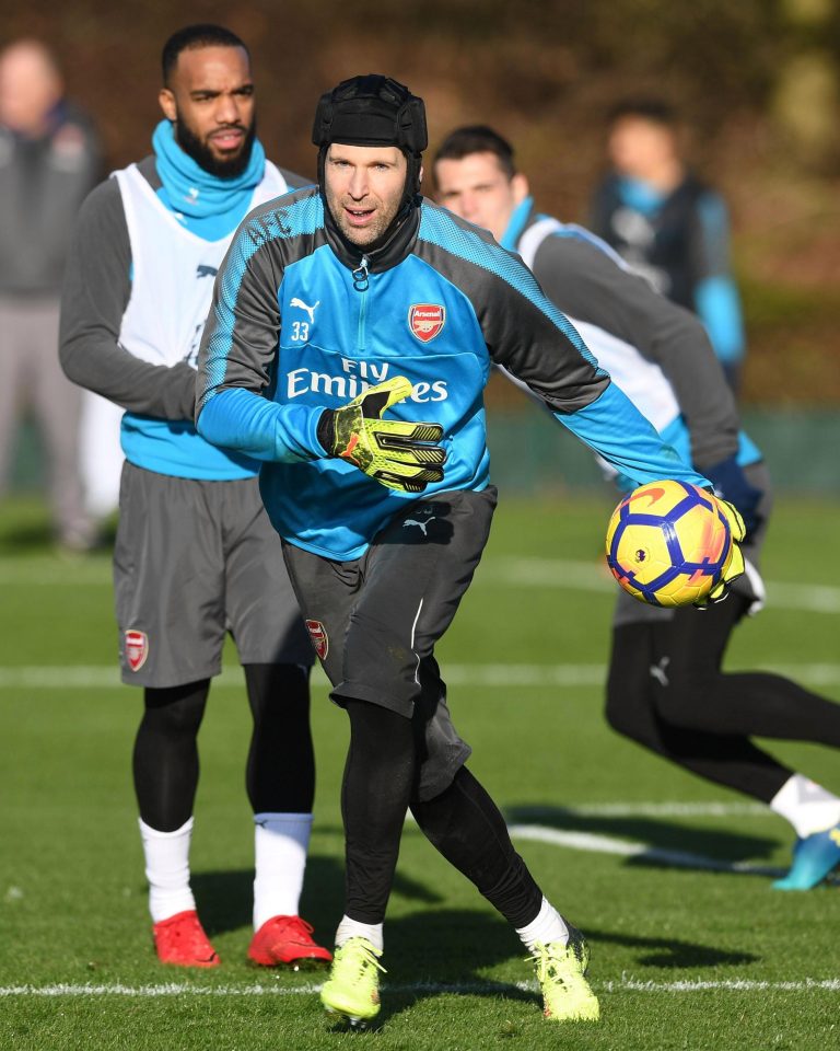  Petr Cech gets his hands on the ball at training