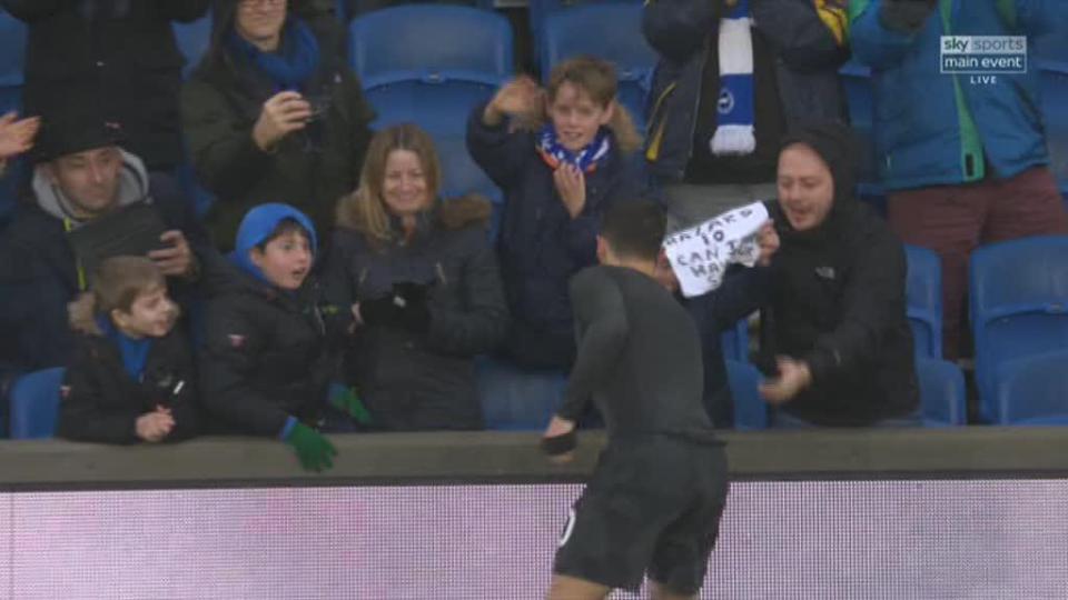  The Chelsea star hands over his shirt to the delight of all the fans in the area