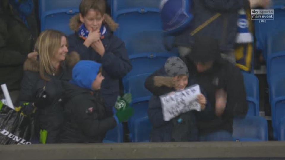  The young fan and his family cannot believe they have got Eden Hazard's shirt