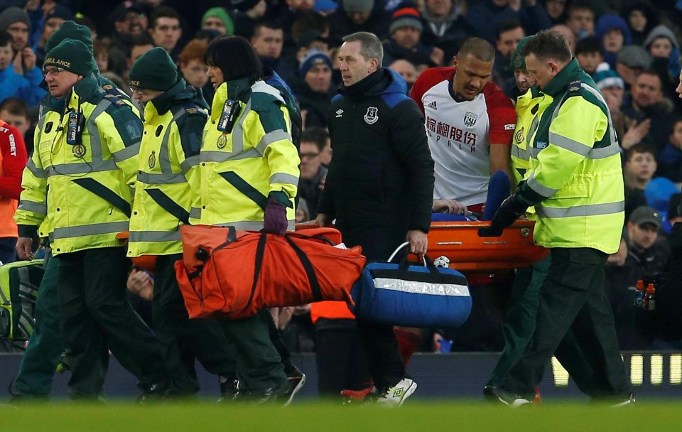 The West Brom striker checks on James McCarthy as he is carried from the field