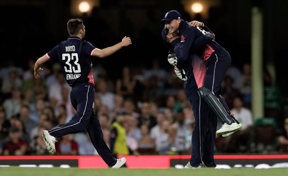  England celebrate the vital wicket of Mitchell Marsh