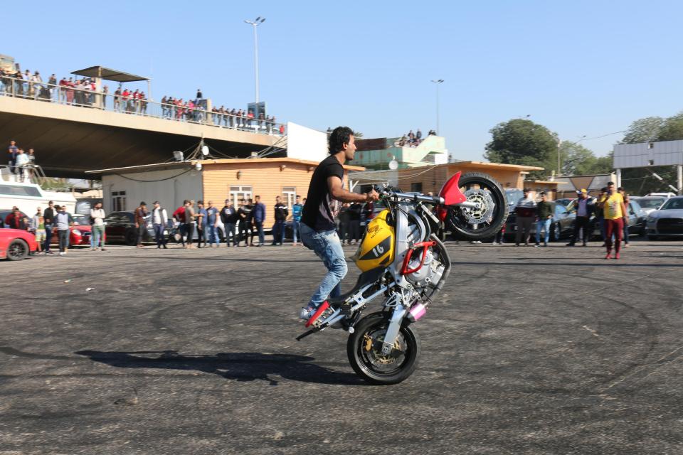  The speedsters put on the show every Friday afternoon under Jadrida Bridge in central Baghdad