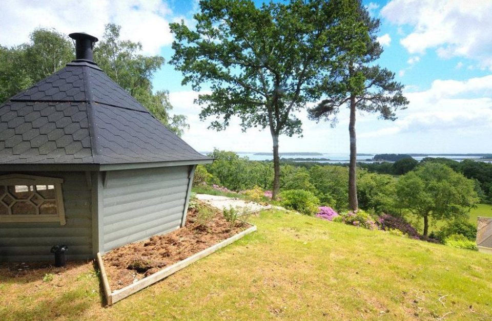  The property comes with acres of land including a cute cabin in the rear garden