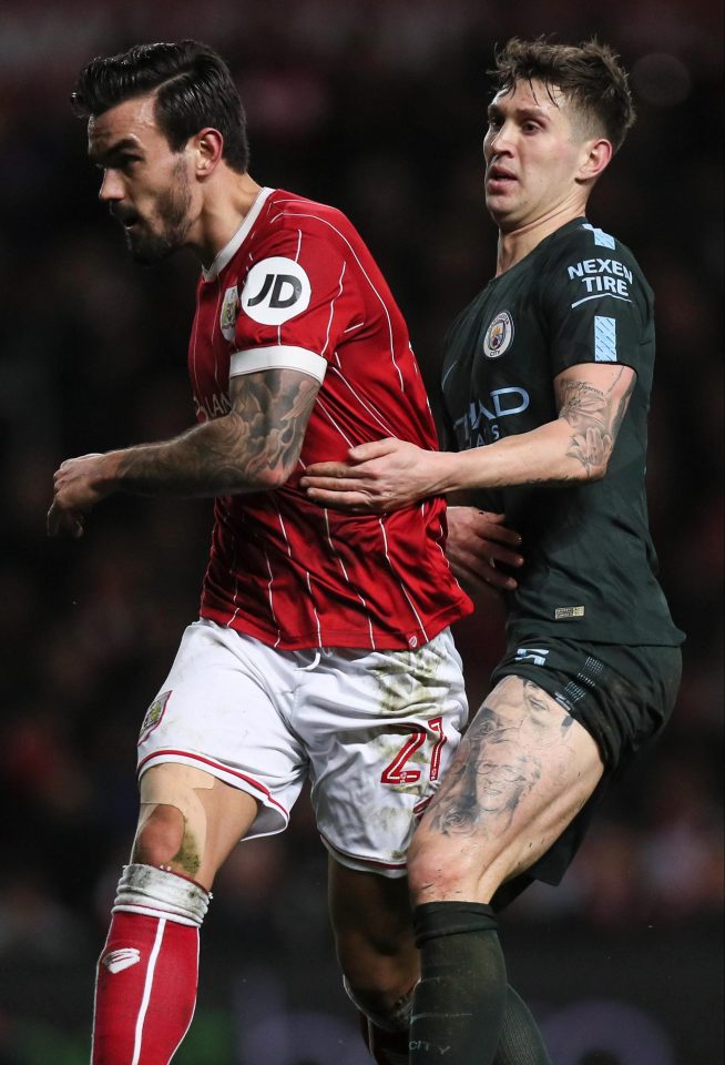  John Stones revealed leg tattoos in last night's win over Bristol City