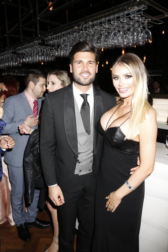  Chloe Sims and Dan Edgar hung out by the bar