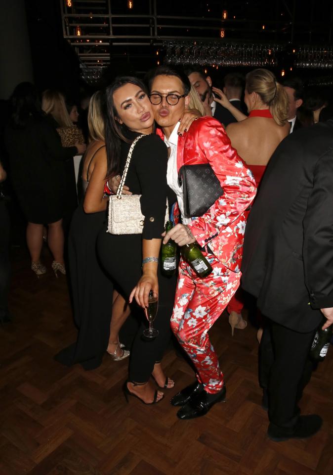  Lauren made sure to keep hold of her champagne while posing with Bobby Norris