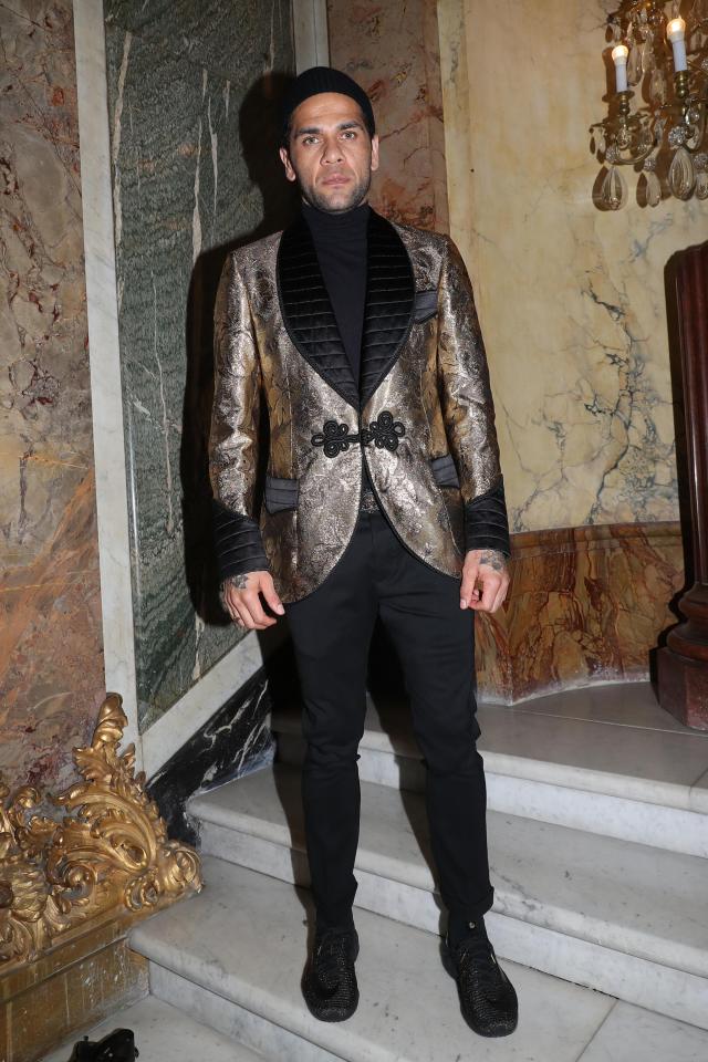  Dani Alves shines in silver as well as gold as he takes on Neymar and David Beckham in the fashion stakes