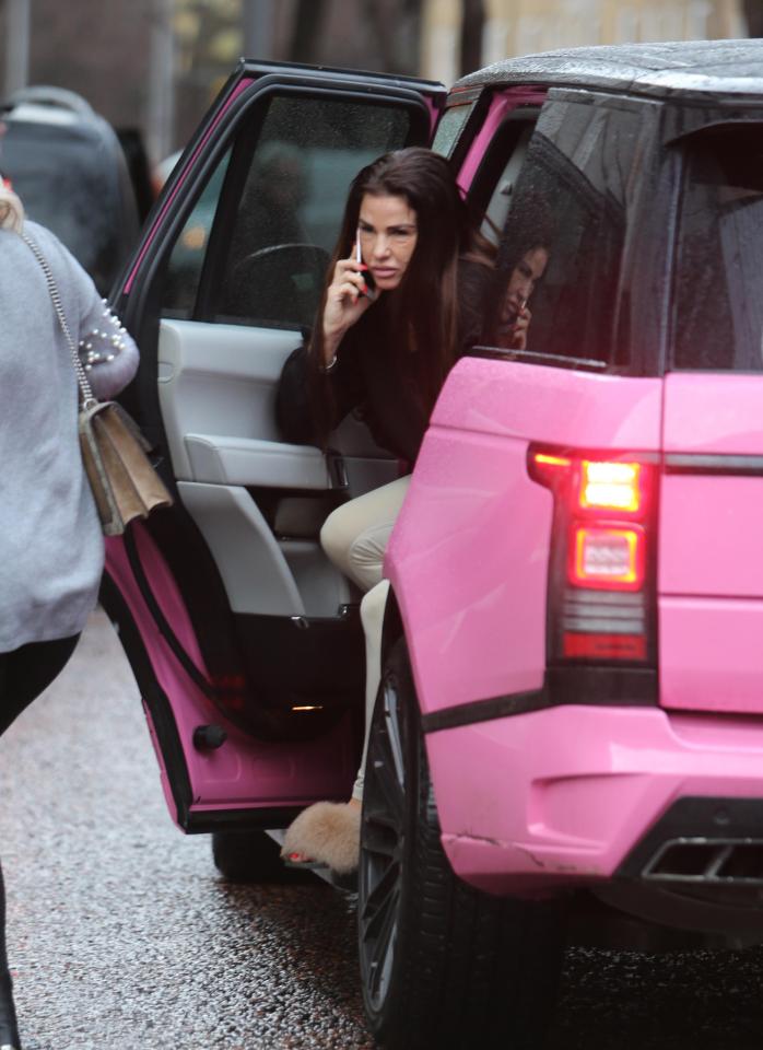  Katie arrived in her distinctive pink car