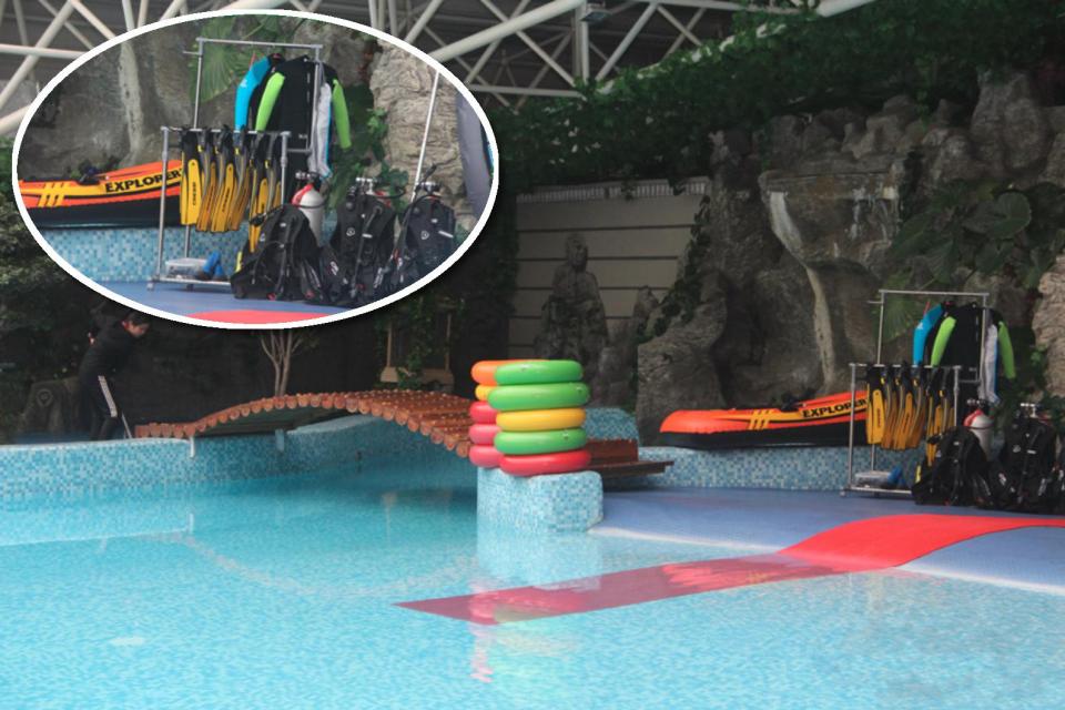 Scuba diving kit can be seen laid out next to the pool in Pyongyang 