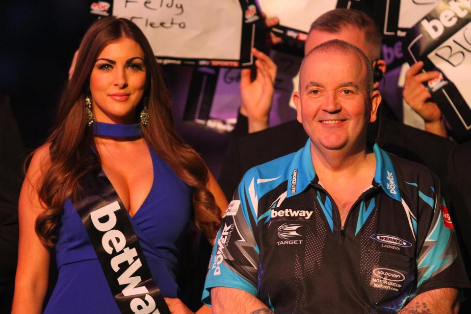  The models have accompanied players, including Phil Taylor, to the oche for more than two decades