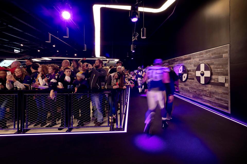  Fans get up close and personal with players when they enter and leave the field