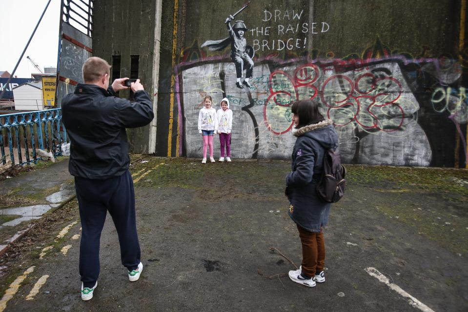  Locals have been taking pictures of the mural and praising 'genius' Banksy