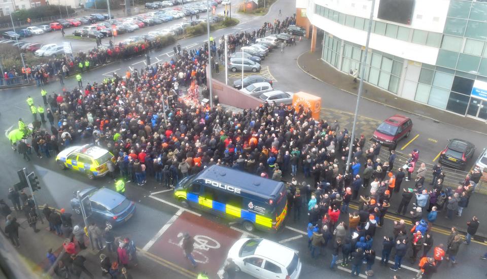  Fans gather around the Jimmy Armfield statue at Bloomfield Road