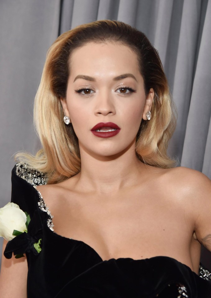 Rita’s style squad had teased her hair into classic Hollywood waves