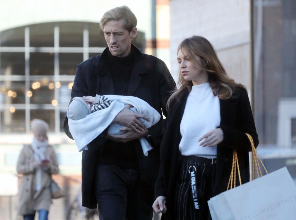 The couple hit the shops with their tot Johnny