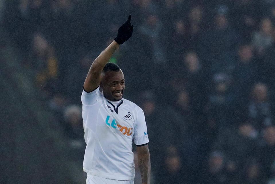  Ayew celebrates what could prove to be a vital goal in Swansea's relegation battle