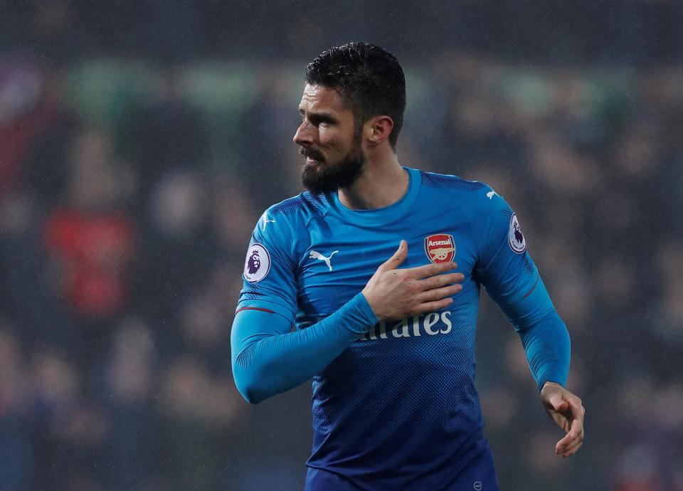  Giroud played for Arsenal against Swansea last night but is now on the verge of joining Chelsea