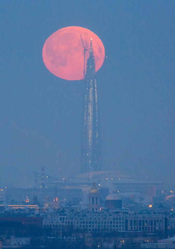  A red super moon over the tower of the Lakhta Centre, which is under construction in Primorsky District of St Petersburg