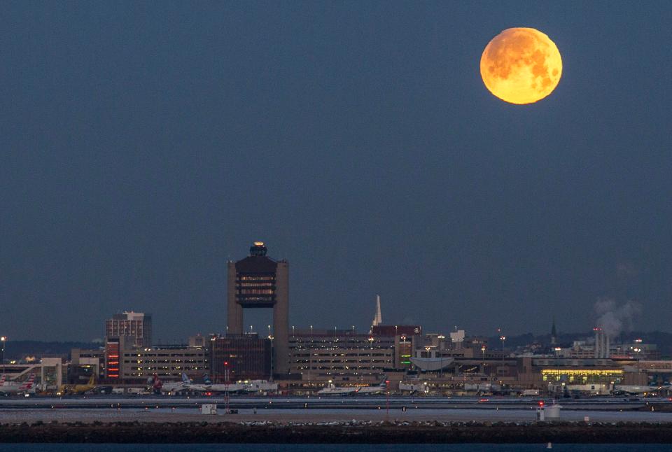  A so-called super moon' sets over the Control Tower at Boston Logan International Airport in Boston, Massachusetts