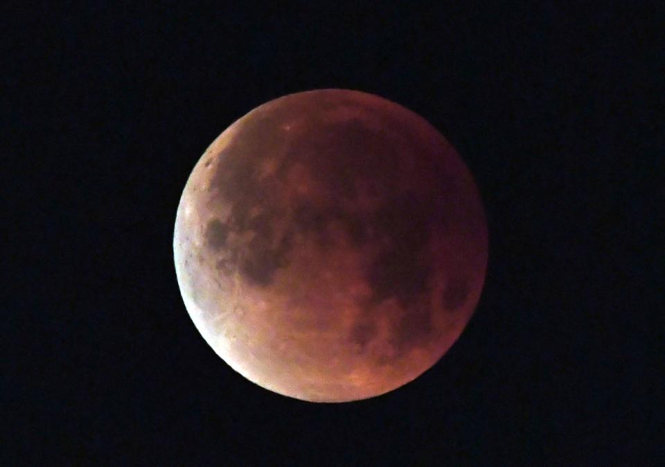  The moon shines over Los Angeles, California