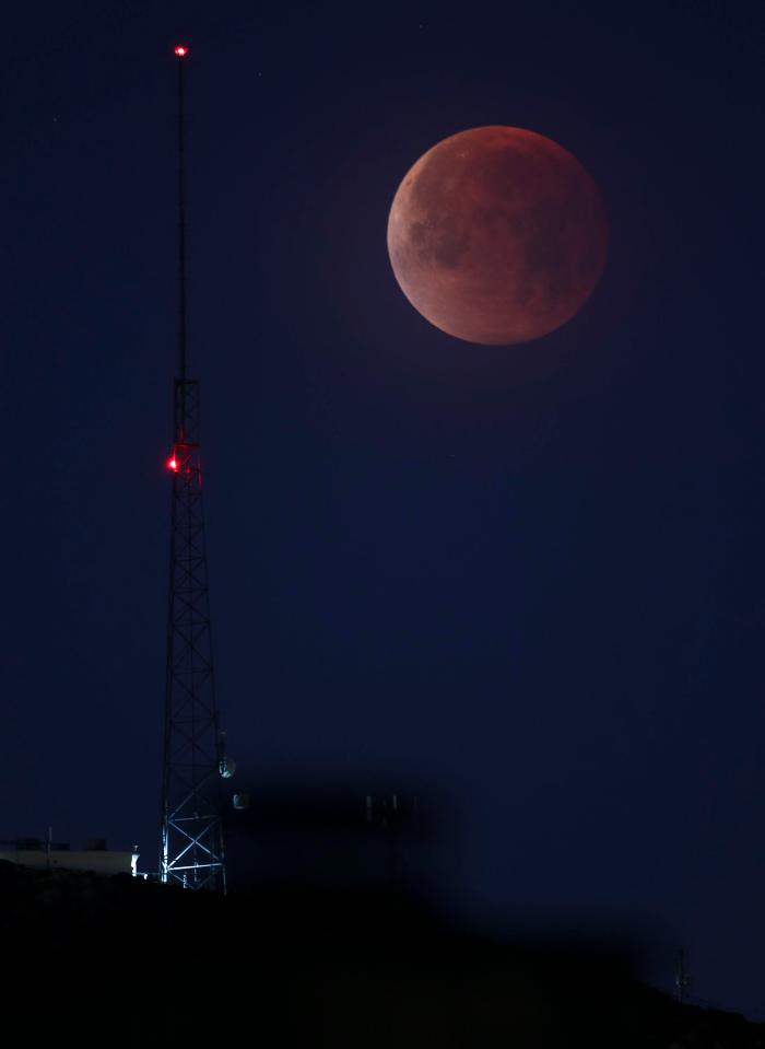  A partially eclipsed super blue blood moon is shown over the skies in Las Vegas