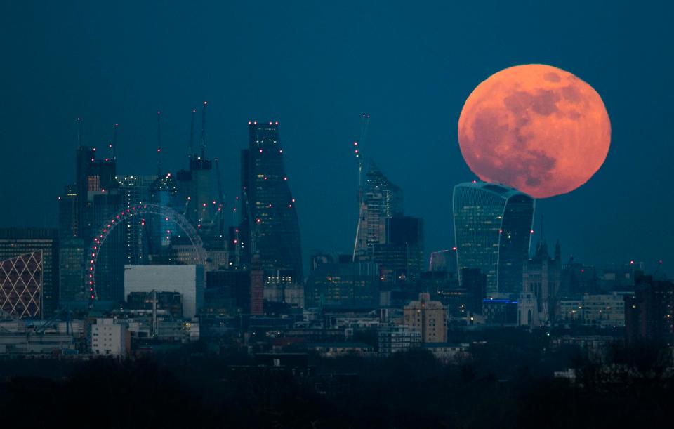  The UK was just treated to a full blue supermoon seen here kissing London's Walkie Talkie yesterday evening