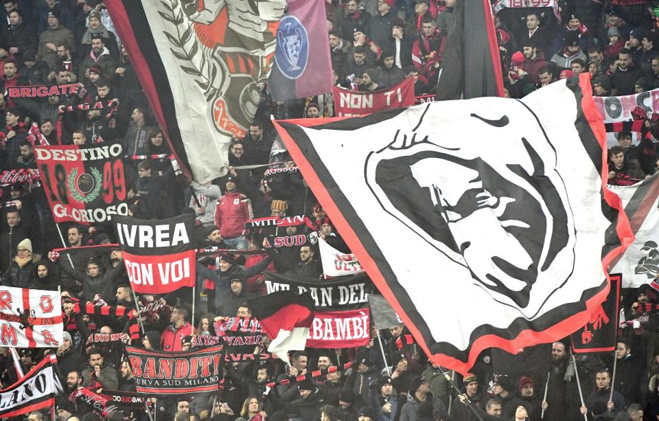  AC Milan fans create a welcoming reception for Lazio in Coppa Italia clash