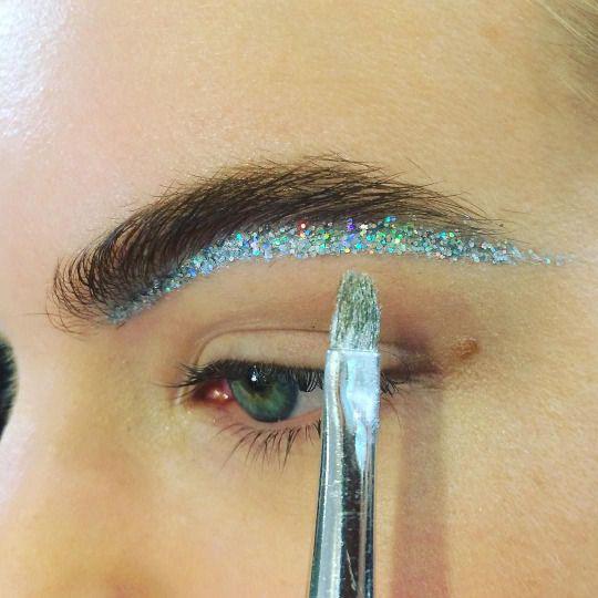  Make-up artists apply the glitter to the top or bottom of the brows for a shimmery look