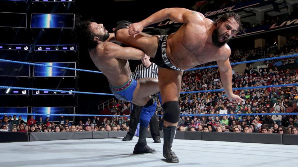  Rusev lands a kick