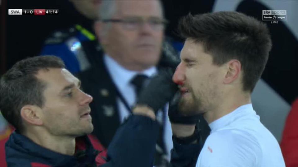  Federico Fernandez was left with a suspected broken nose after being injured celebrating Swansea's goal against Liverpool