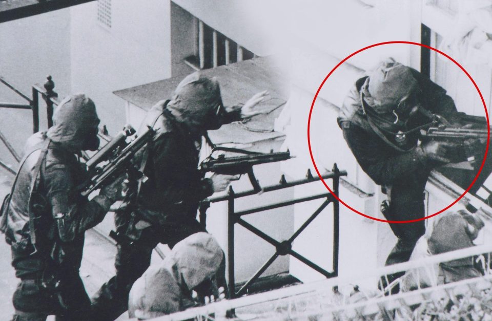  The SAS hero, circled, was known as 'Backdoor Bob' after bravely storming the rear door of the Embassy