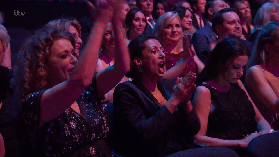  Katie looks bored as her co-hosts Nadia Sawalha and Saira Khan cheer on category winners Holly and Phillip