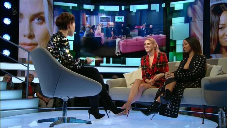  The girls sat side by side as they chatted to Emma Willis