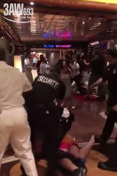 A large group of passengers brawl on the Carnival Cruise ship