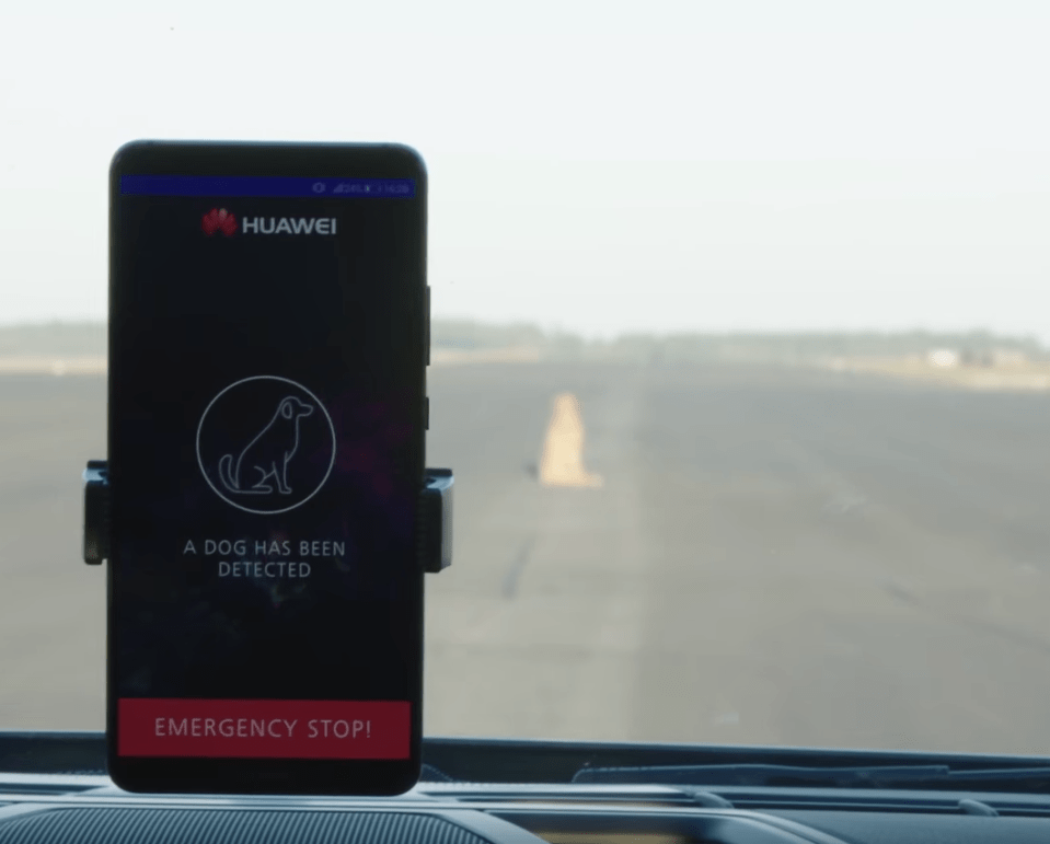  In the video, Hauawei's phone detects a dog and turns the car's wheel to avoid it