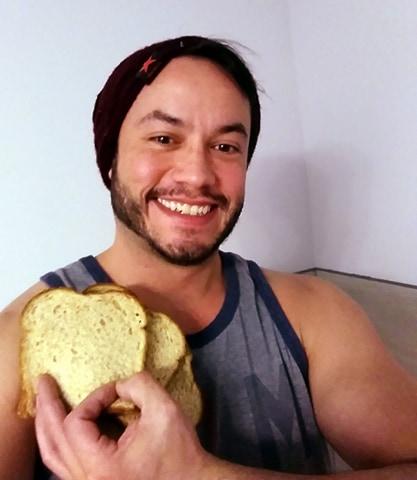  Lee St John, 34, who came up with the Earth Sandwich poses with slices of bread