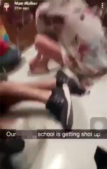  Terrifying footage shows pupils lying on the ground as gunfire rings out