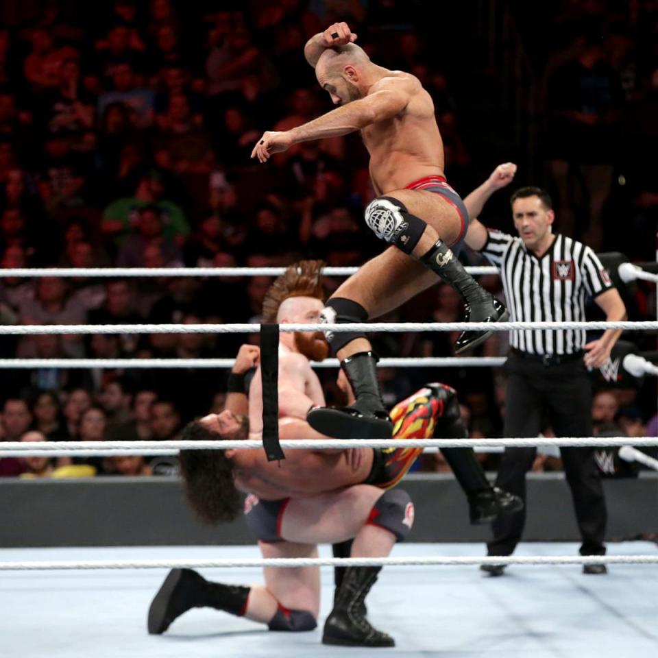  The Bar nailing Seth Rollins with a double-team move