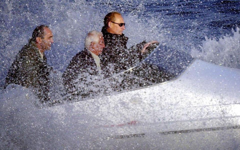  The politician is seen at the controls of an expensive speedboat