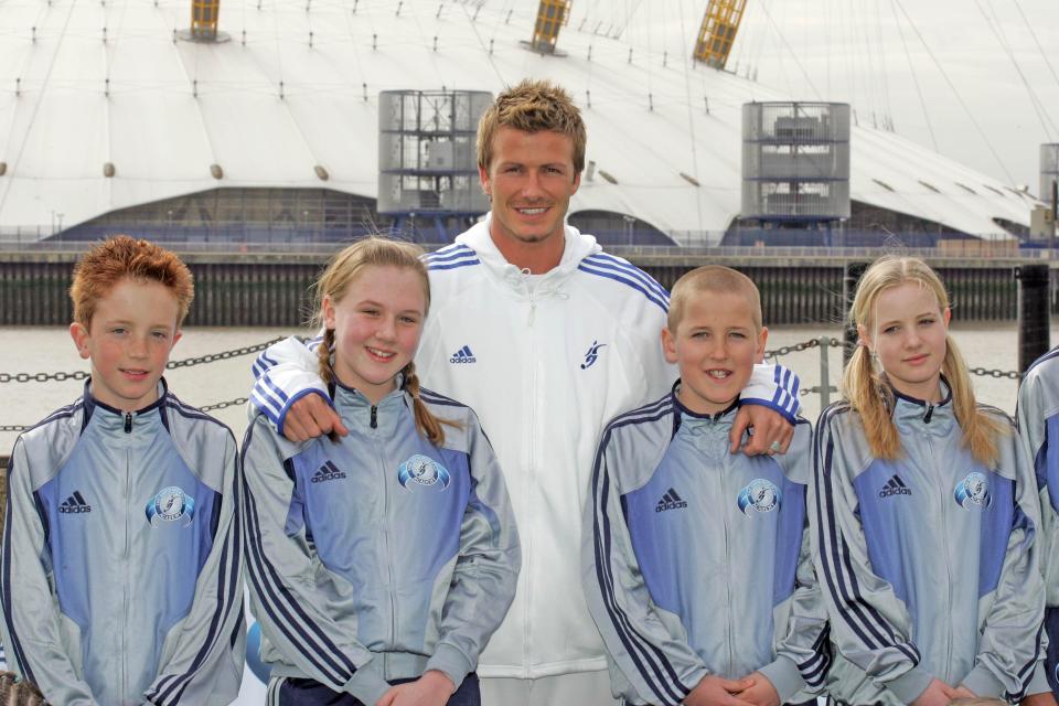  David Beckham and a grinning Harry Kane smile for the camera