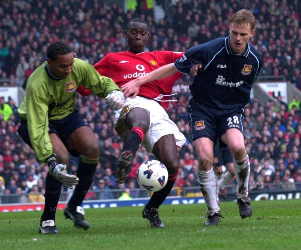  Shaka Hislop scrambles to gather a ball from Man Utd striker Andy Cole