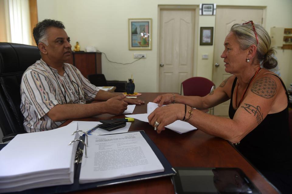  Fiona MacKeown speaking with her lawyer Vikram Varma in 2016